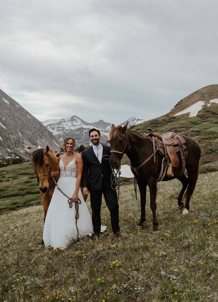 Bride and grooms horseback elopement photos at Hoosier Pass in Colorado