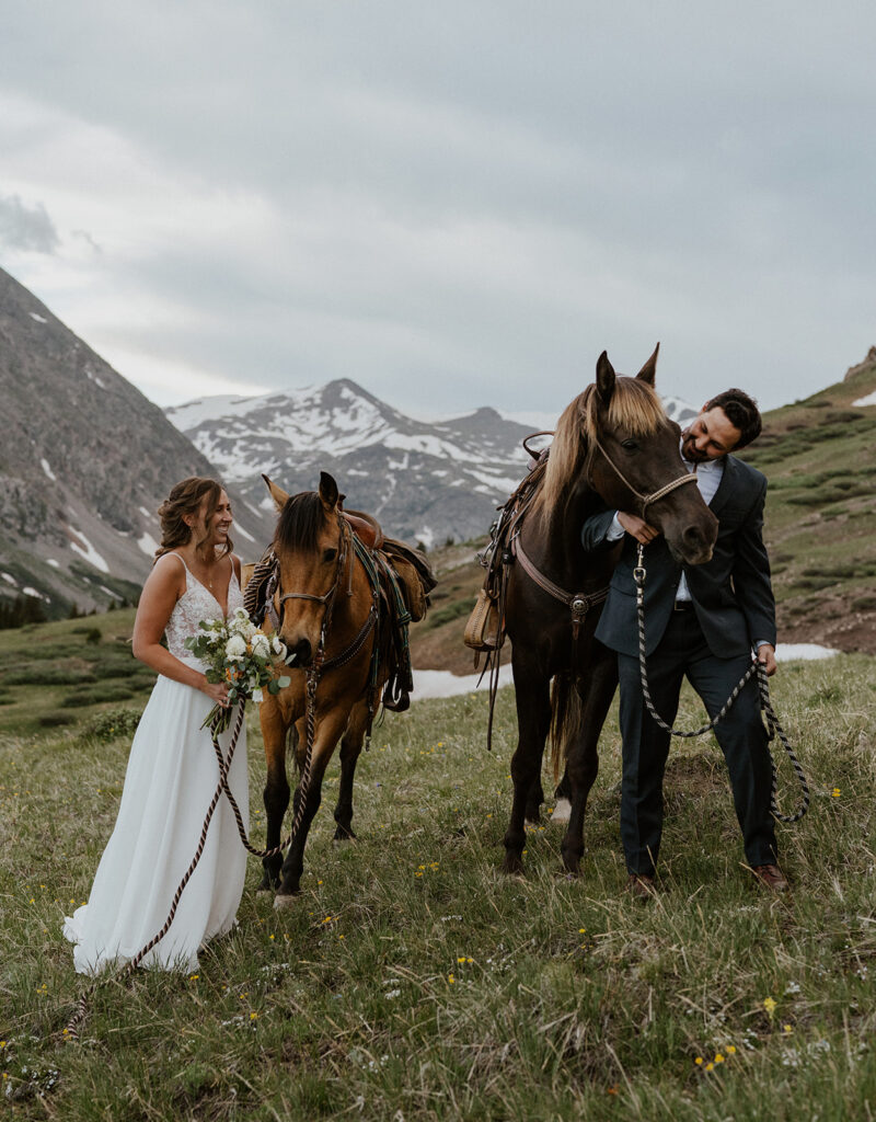 Bride and grooms horseback elopement photos at Hoosier Pass in Colorado