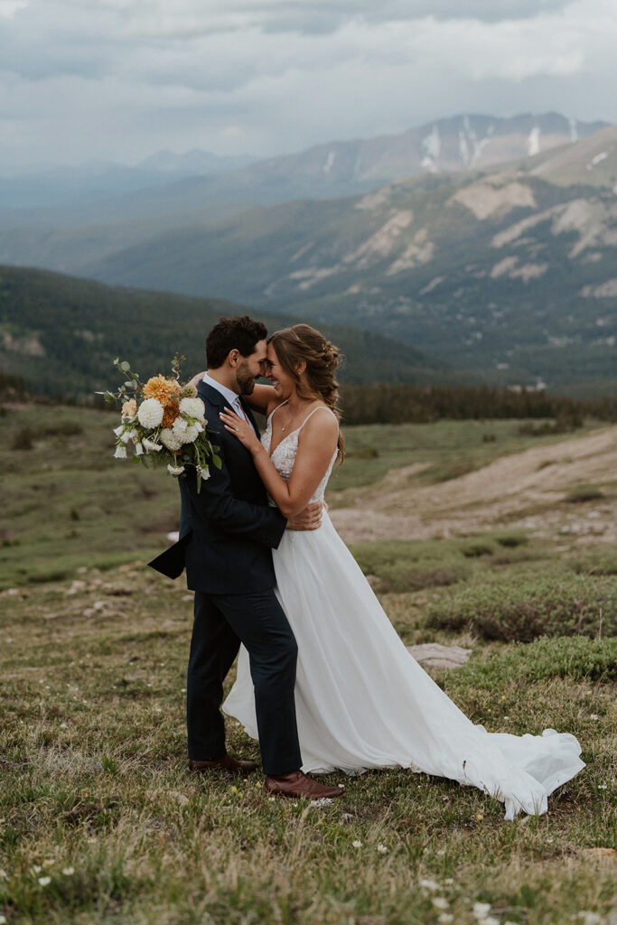 Mountain elopement portraits of a bride and groom during their Hoosier Pass elopement in Colorado