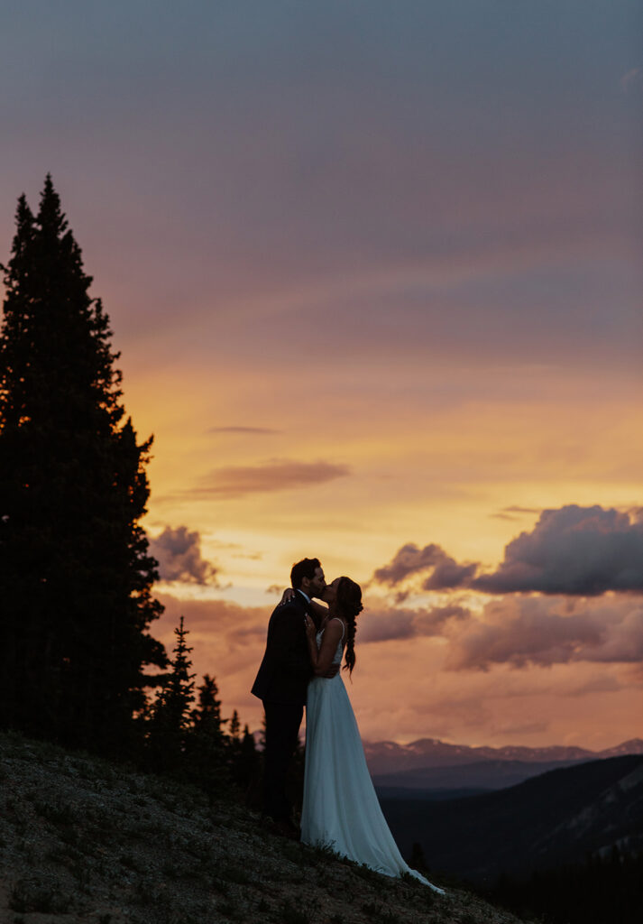 Bride and grooms sunset elopement portraits at Hoosier Pass in Colorado