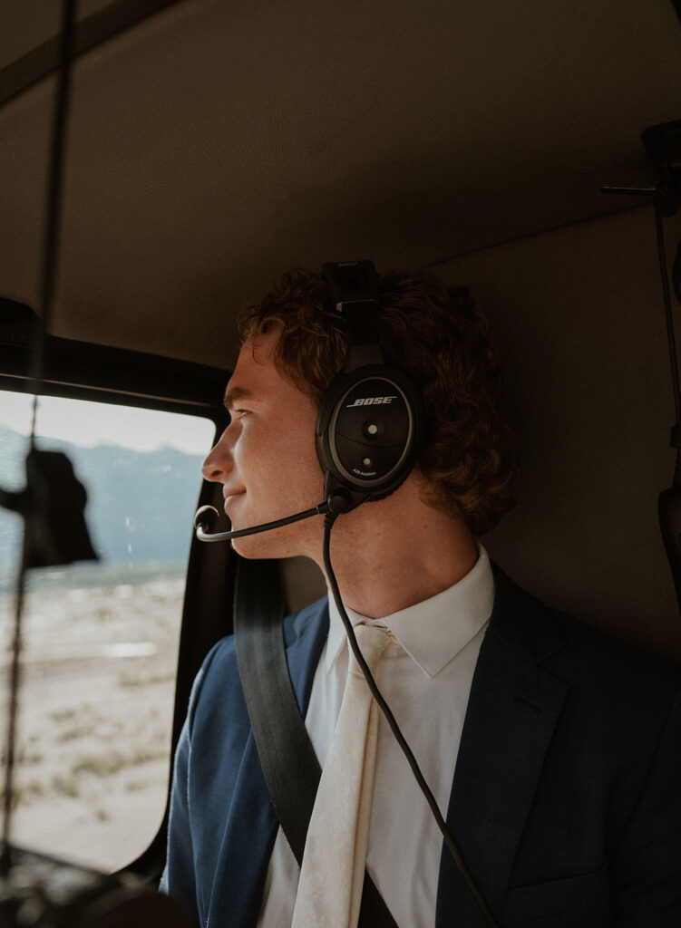 Grooms portraits in a helicopter from Outbound Heli for their Alaska helicopter elopement at Knik Glacier