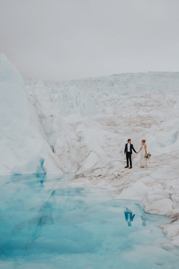 Bride and grooms portraits at Knik Glacier from their Alaska helicopter elopement