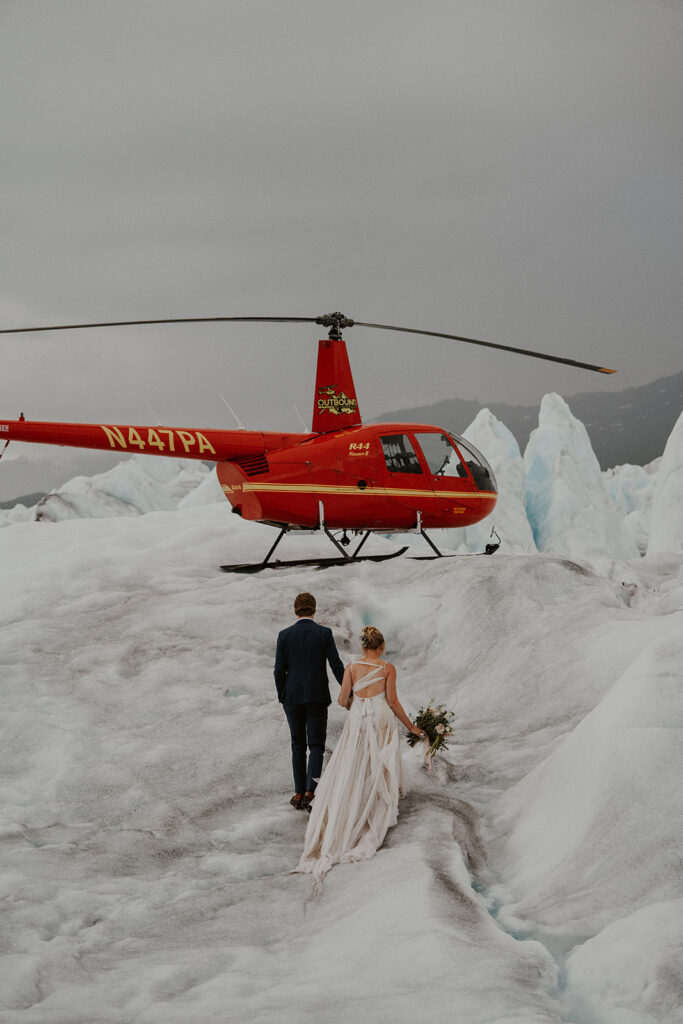 Bride and grooms portraits at Knik Glacier from their Alaska helicopter elopement