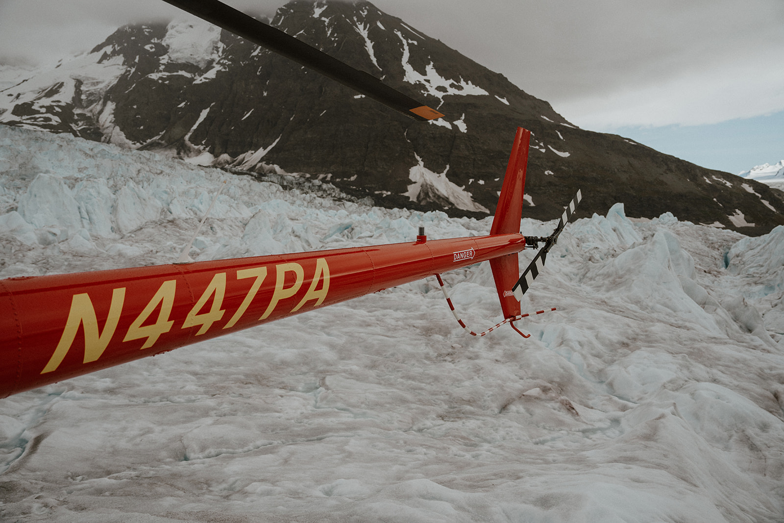 Tail of a helicopter from Outbound Heli