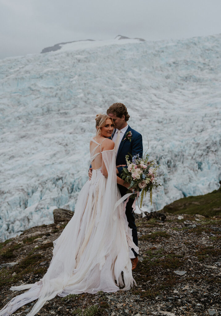 Bride and grooms portraits from their adventure Alaska helicopter elopement at Knik Glacier