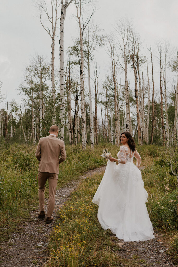 Bride and groom walking to their Telluride, Colorado elopement location