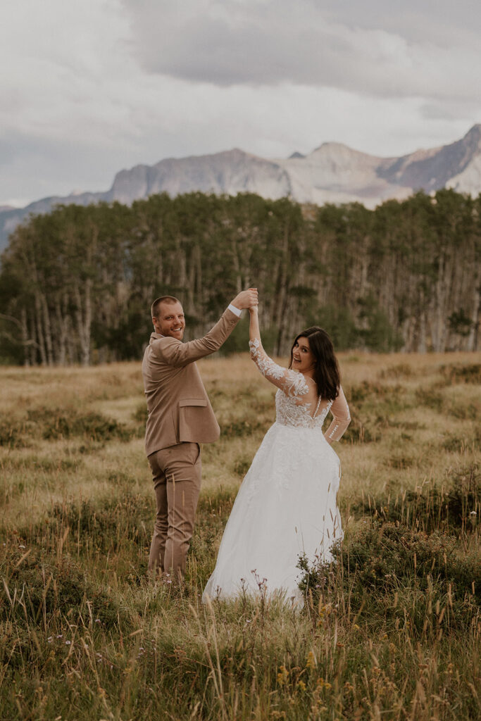 Bride and groom celebrating after their intimate Telluride, Colorado elopement ceremony