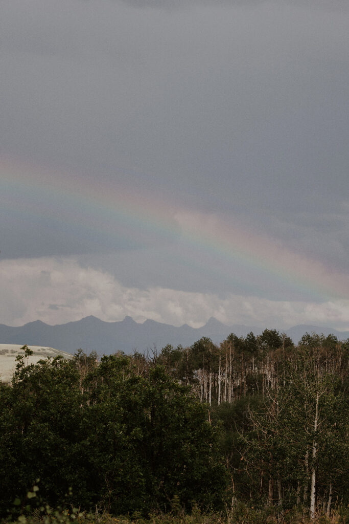 A blue sky with a rainbow