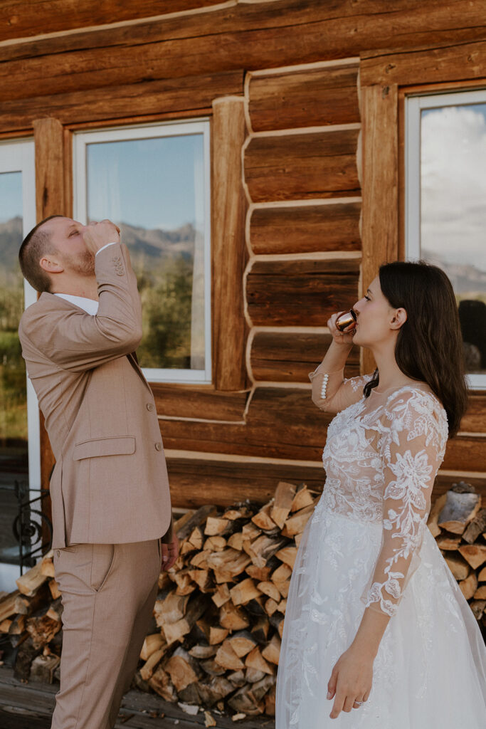 Bride and grooms celebratory maple syrup shots after their Telluride, Colorado elopement