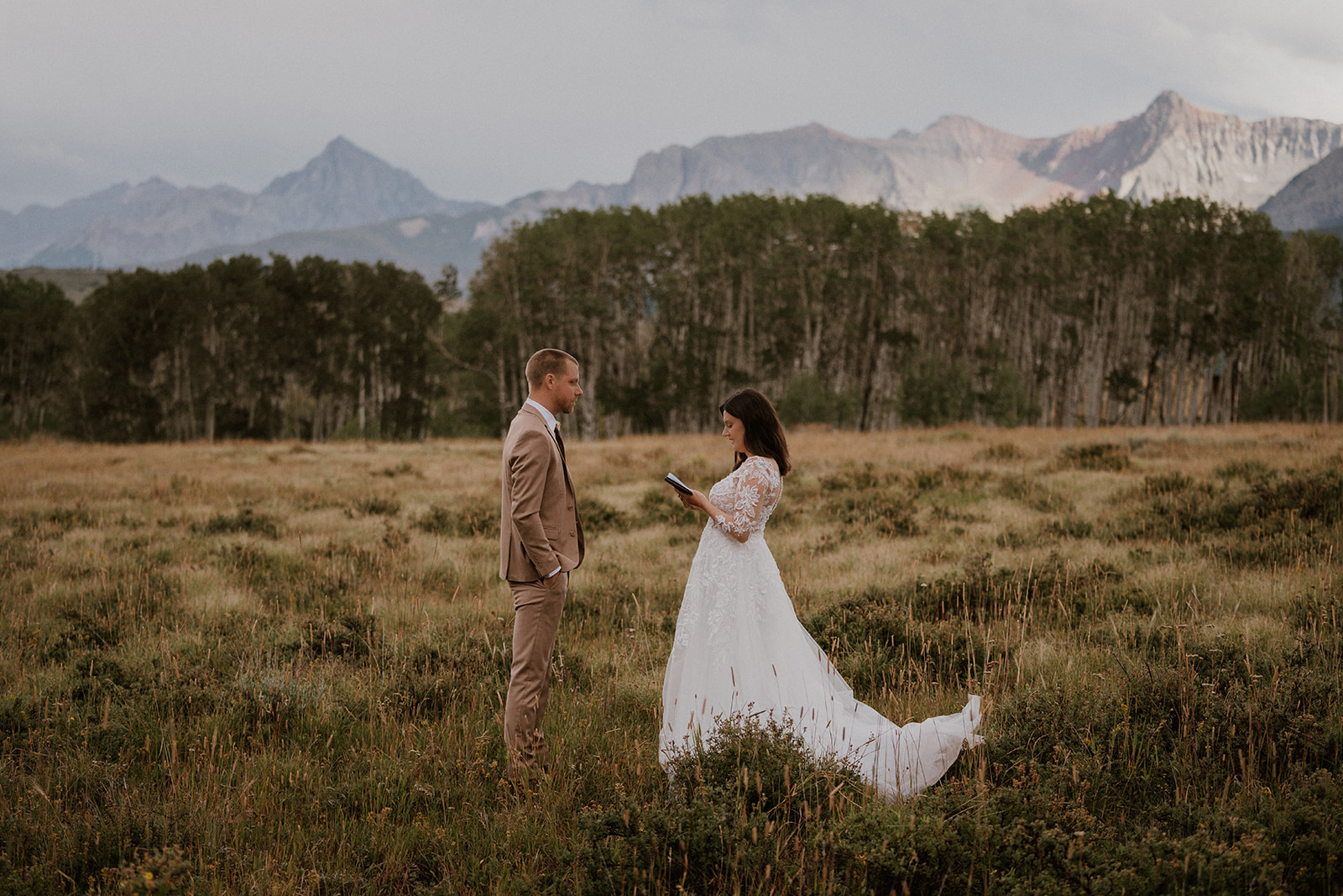 Bride exchanging her vows to her groom during their Telluride Colorado elopement at Last Dollar Road