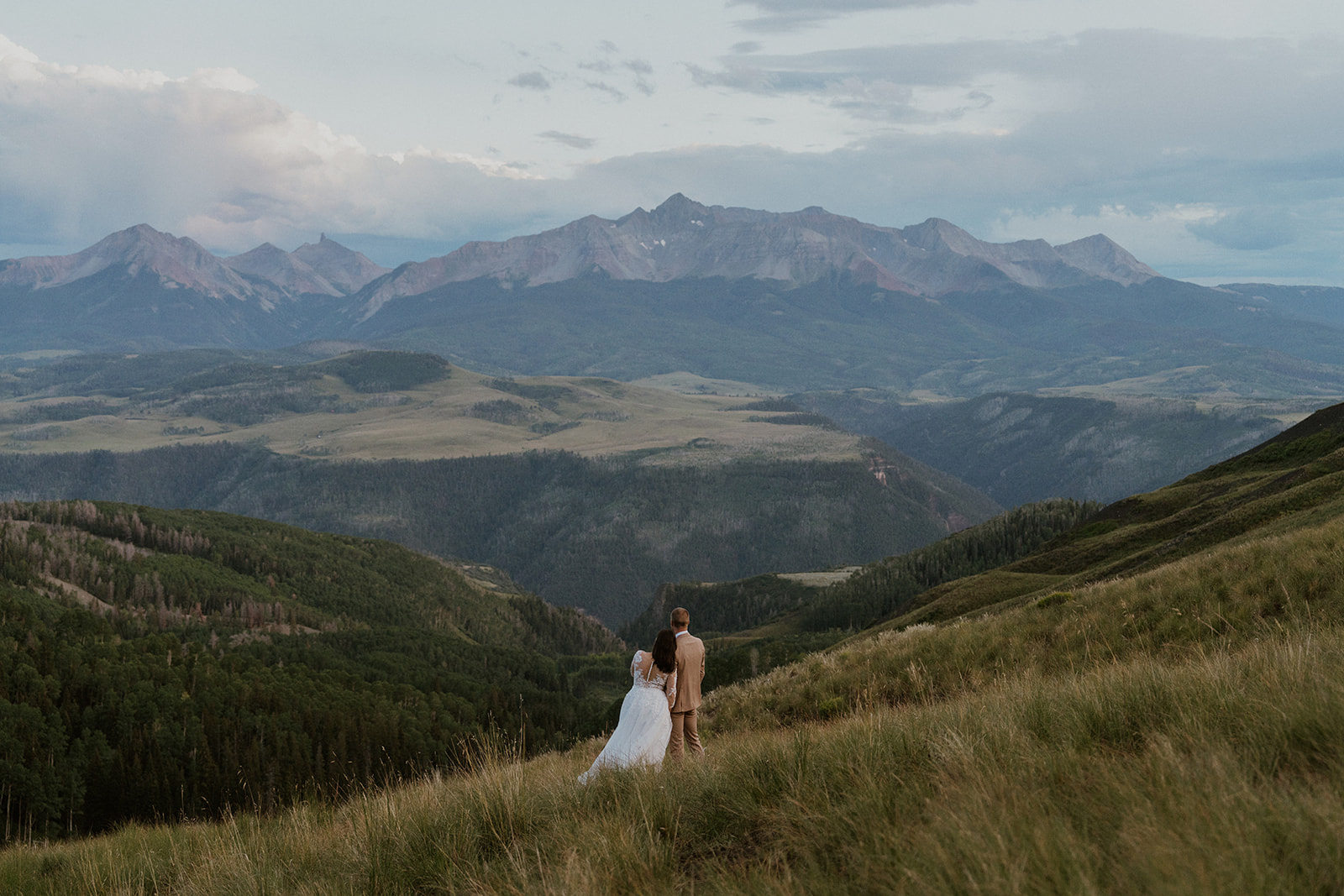 Bride and groom admiring the mountains during their Telluride Colorado elopement