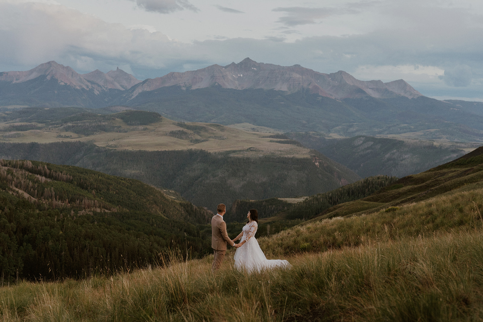 Bride and groom admiring the mountains in Telluride, Colorado