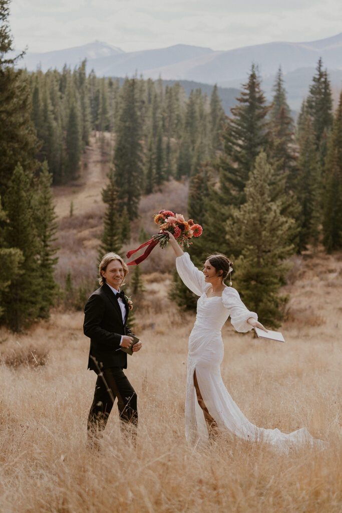 Bride and groom celebrating after their elopement ceremony