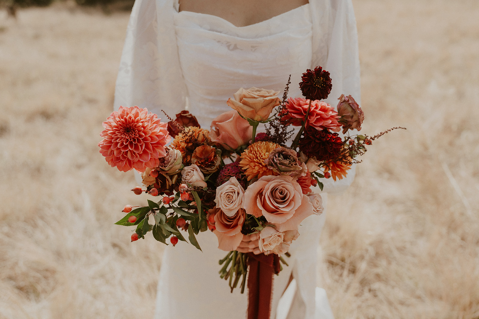 Bride holding her Breckenridge elopement bouquet by Double Dutch Floral.