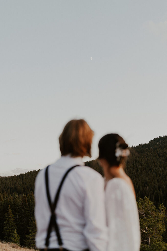 Bride and groom admiring the moon