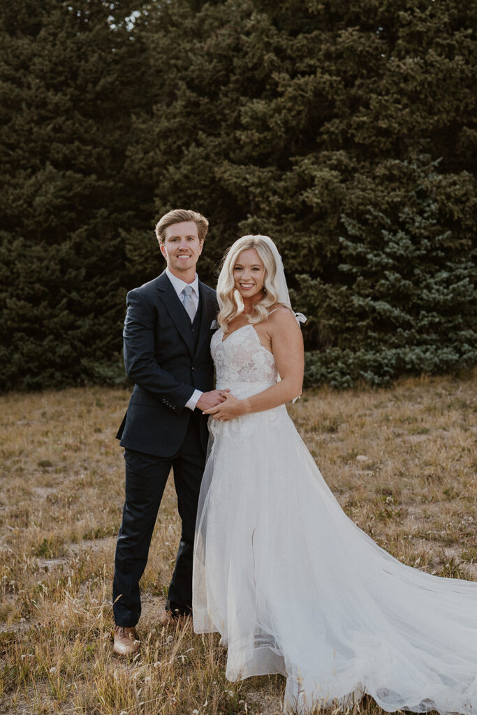 Outdoor bride and grooms portraits in Colorado