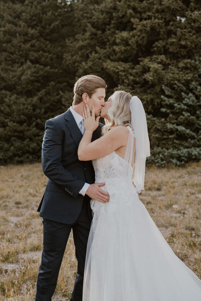 Outdoor bride and grooms portraits in Colorado