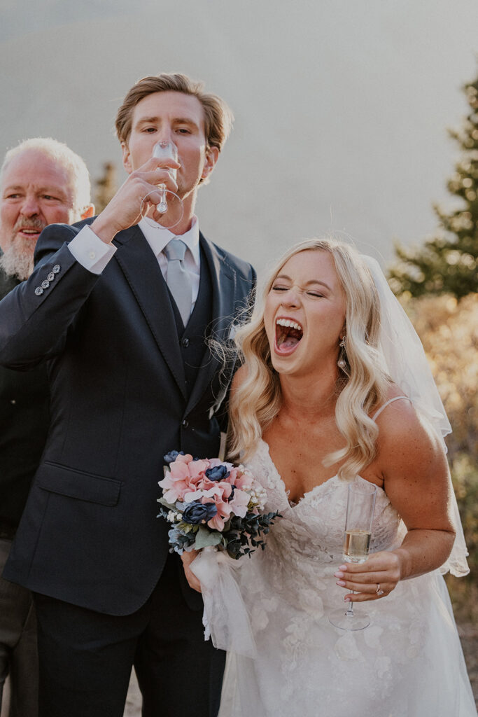 Bride and groom with champagne after their intimate ceremony