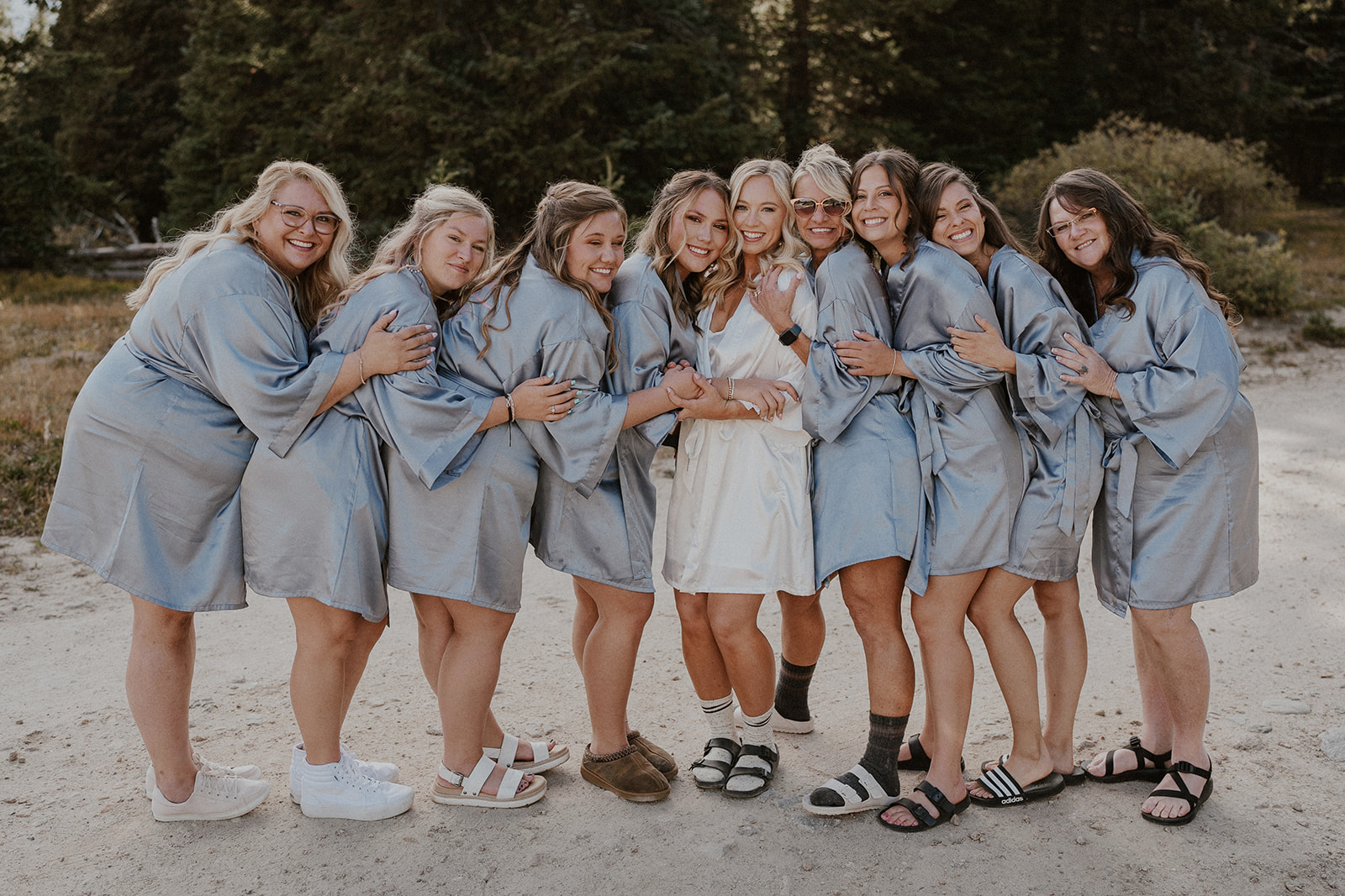 Bride posing with her closest friends and family