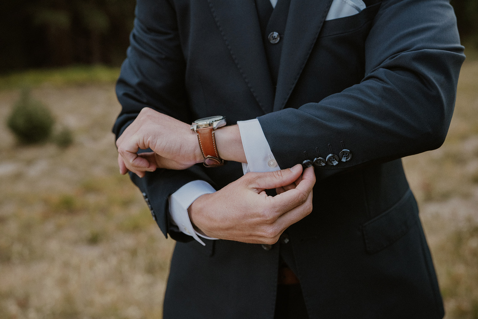 Outdoor grooms portraits from an intimate Breckenridge wedding in Colorado