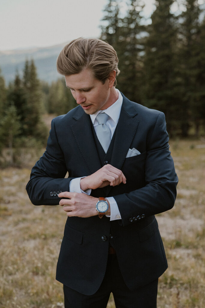 Outdoor grooms portraits from an intimate Breckenridge wedding in Colorado