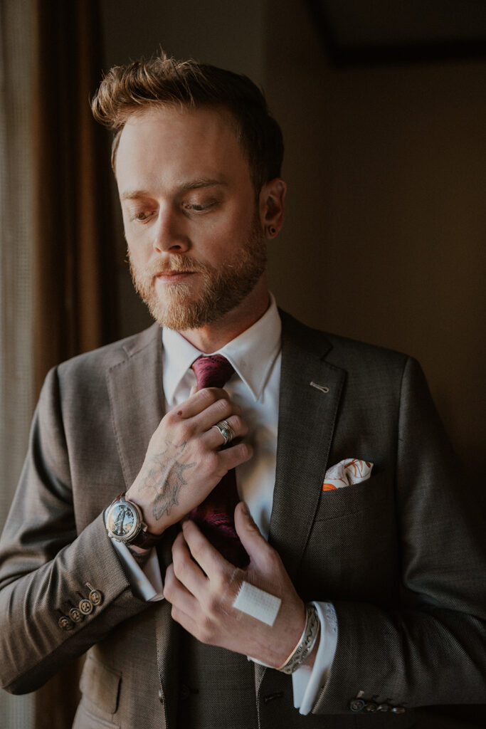 Grooms indoor portraits from an Aspen, Colorado elopement