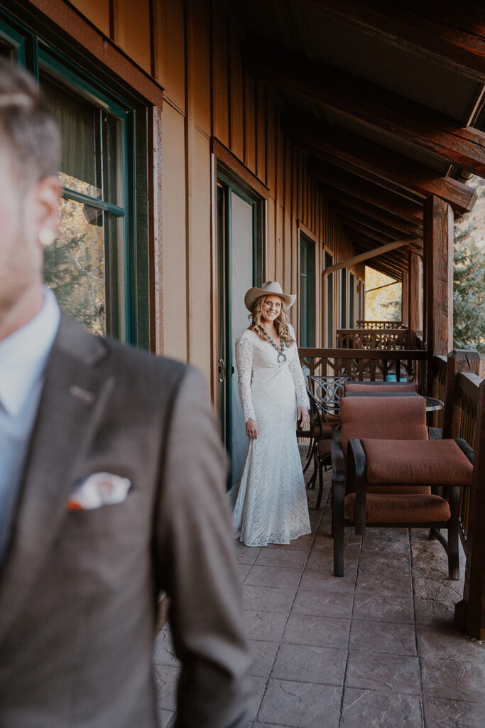 Bride walking out to share a first look with her groom