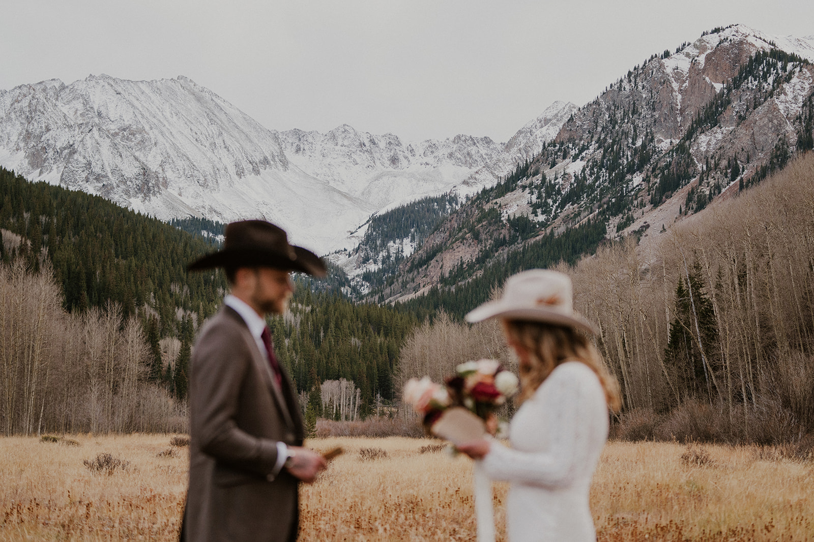 Bride and groom exchanging private vows in the Colorado mountains