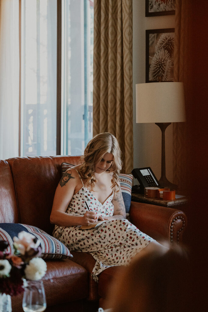 Bride writing her wedding vows