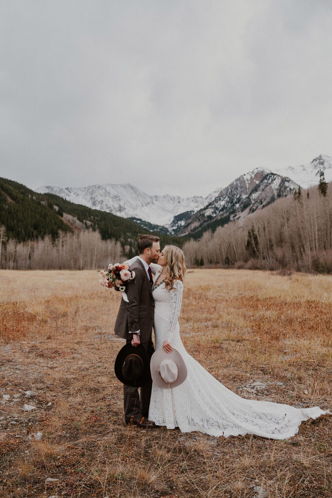 Bride and groom kissing during their intimate Aspen, Colorado elopement