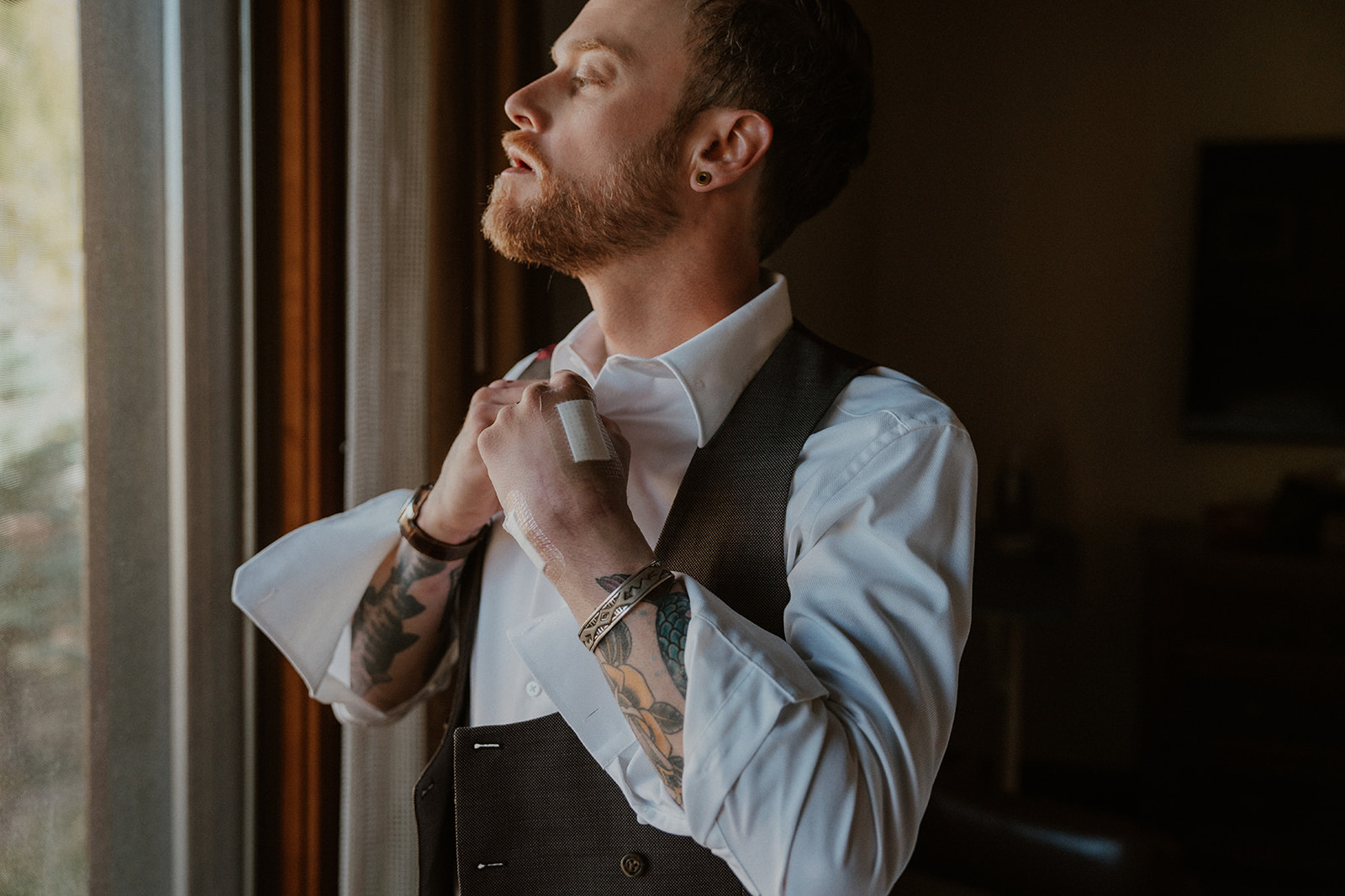 Groom getting ready for his Aspen, Colorado elopement