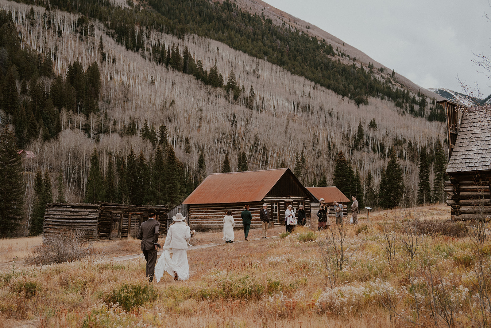 Bride, groom, and their guests heading back for their Ashcroft Ghost Town elopement in Aspen, CO