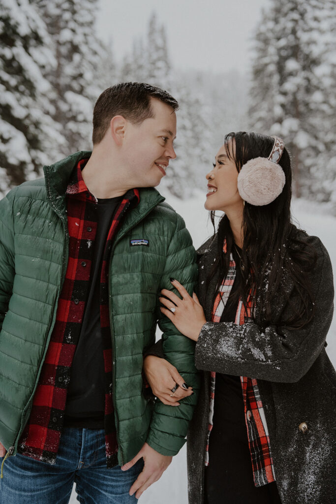 Couple posing during their snowy Colorado photoshoot for their Boreas Pass engagement